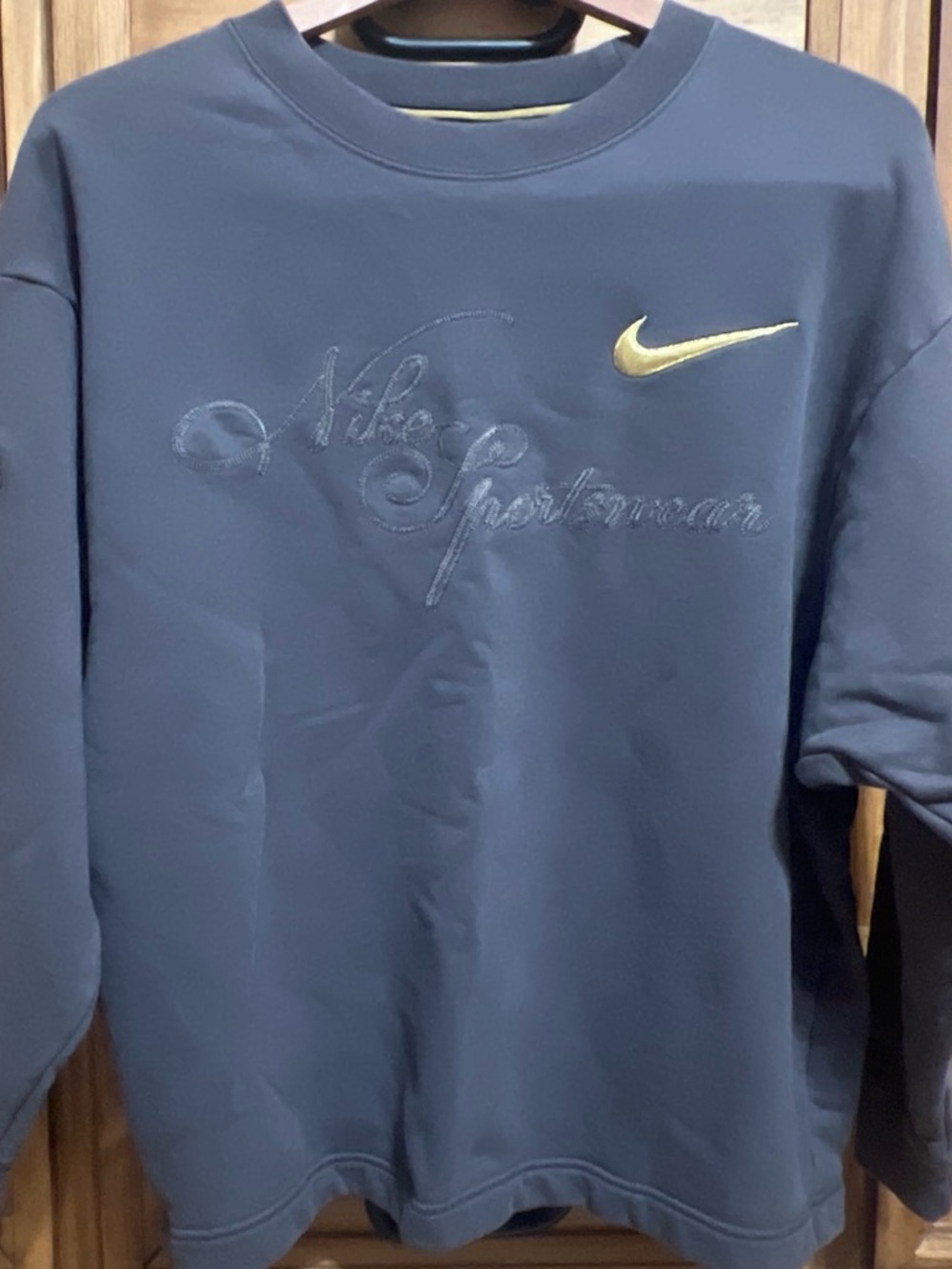 Nike women’s Navy Crewneck Sweatshirt with Gold Swoosh